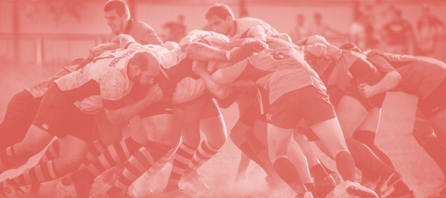Rugby players in a scrum with a red overlay
