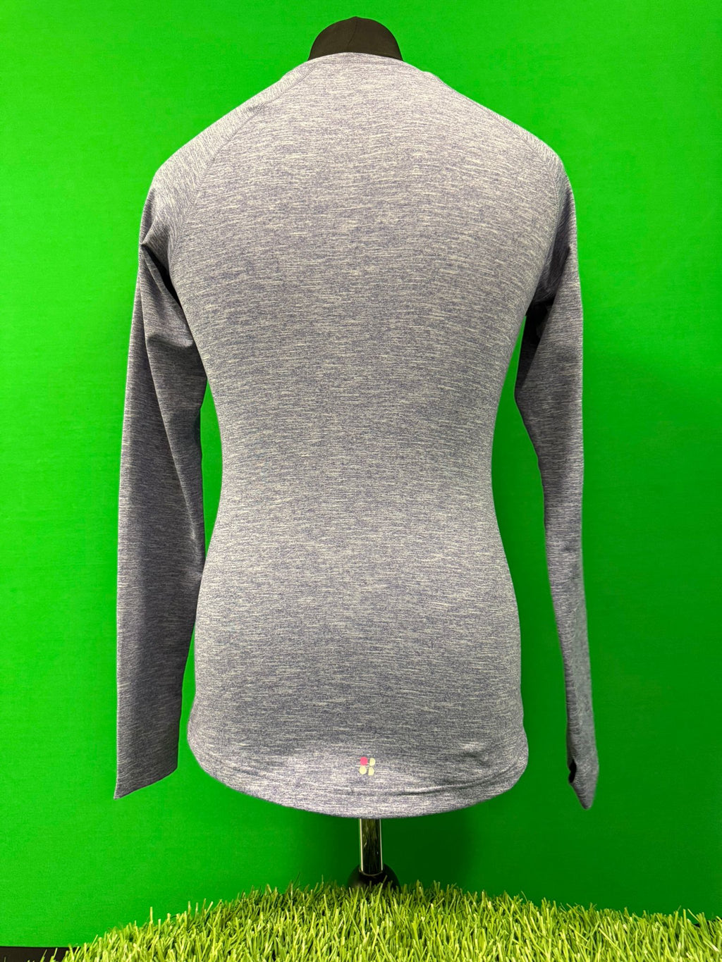 Back view of Sweaty Betty purple long sleeve top on mannequin