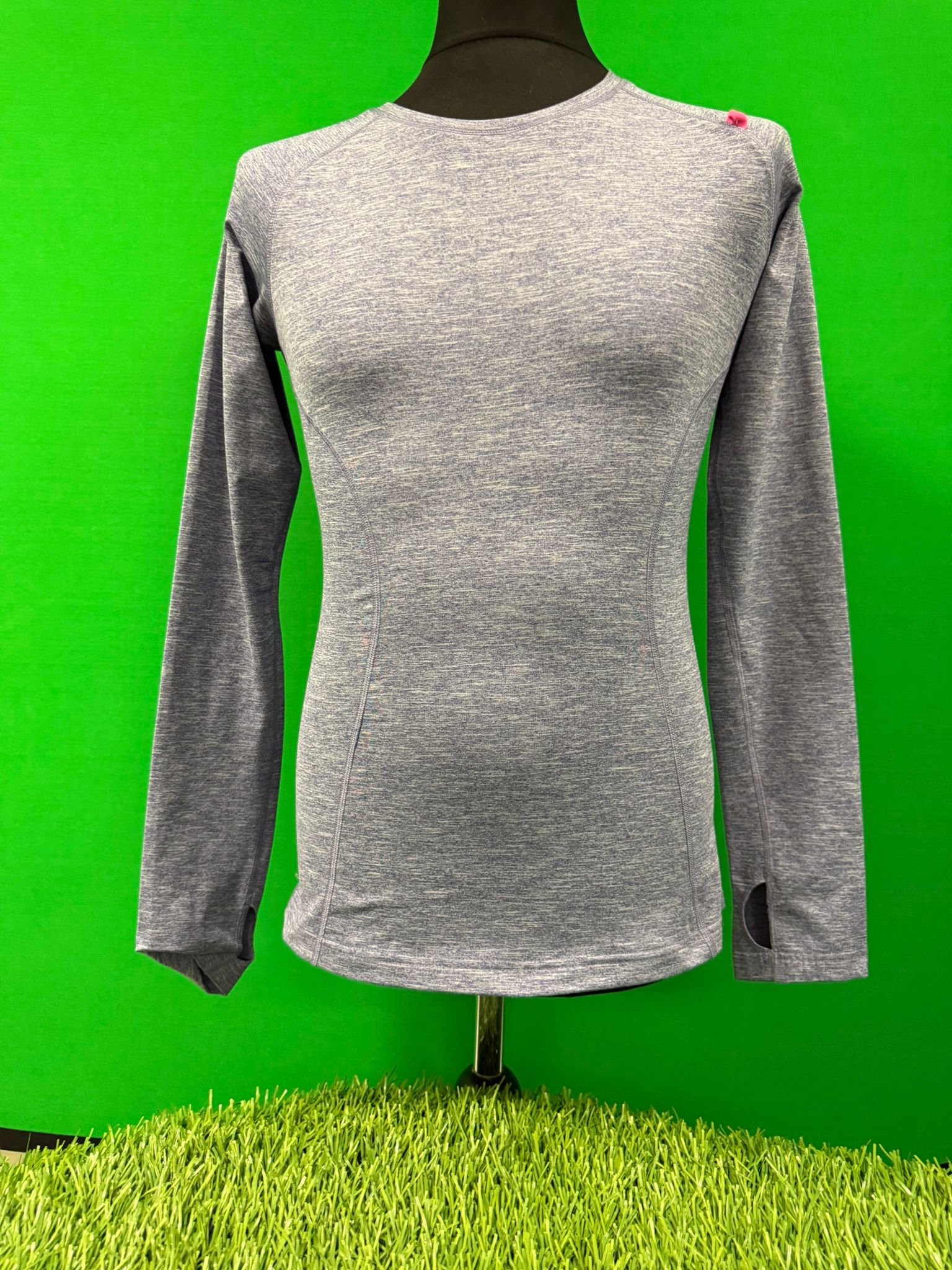 Front view of Sweaty Betty purple long sleeve top on mannequin