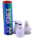 Tube of Yonex Mavis 300 nylon shuttlecocks with three white shuttlecocks on artificial grass