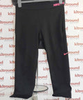 Front view of Nike Dri-FIT black sports leggings XL displayed on a mannequin