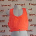 Neon orange Sweaty Betty sports bra on mannequin