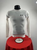Front view of white Under Armour long-sleeve compression top on mannequin