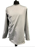 Front view of grey Under Armour long sleeve shirt on mannequin