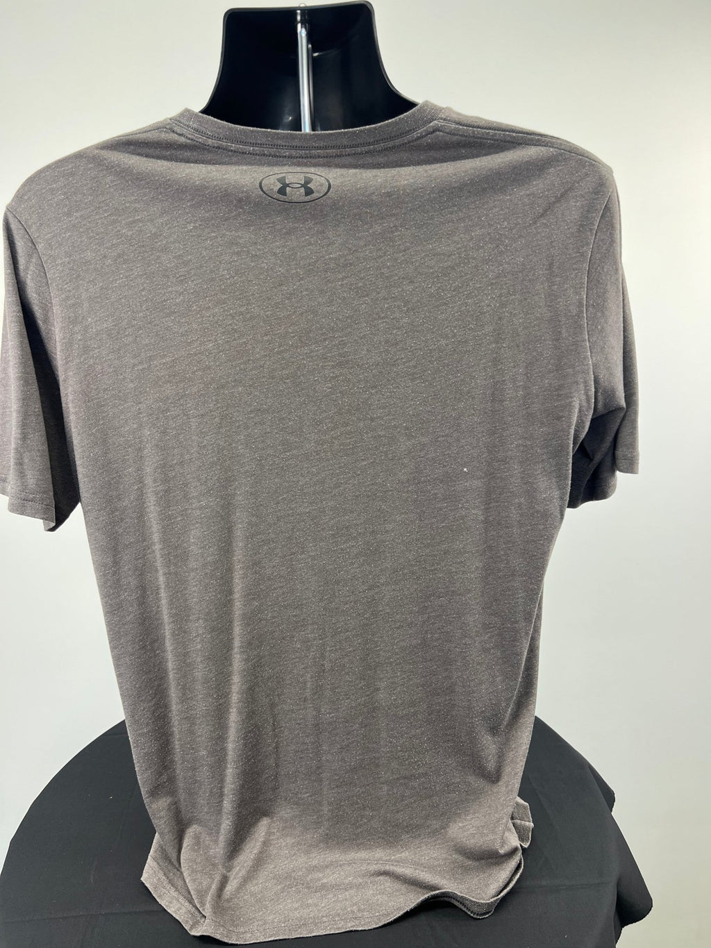 Back view of grey Under Armour t-shirt on mannequin