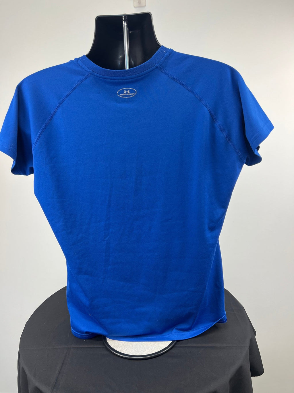 Back view of a blue Under Armour V-neck semi-fitted T-shirt in size large