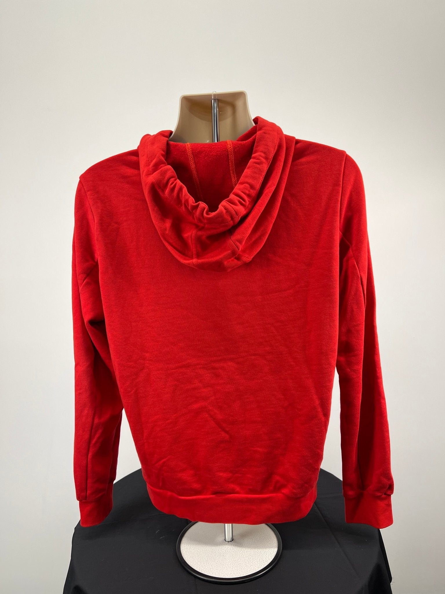 Back view of plain red Volleyball England hoodie showing hood and ribbed cuffs