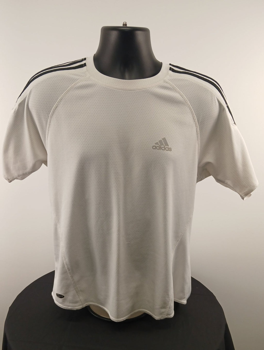 Front view of white short sleeved adidas t-shirt size M
