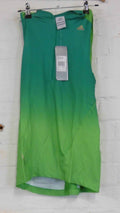 Front view of women's adidas gradient green double layer sports top with half zip and tags