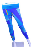 Front view of Asics blue geometric print sports leggings on mannequin