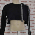 Front view of black Gymshark cropped sweatshirt with stripe details on mannequin