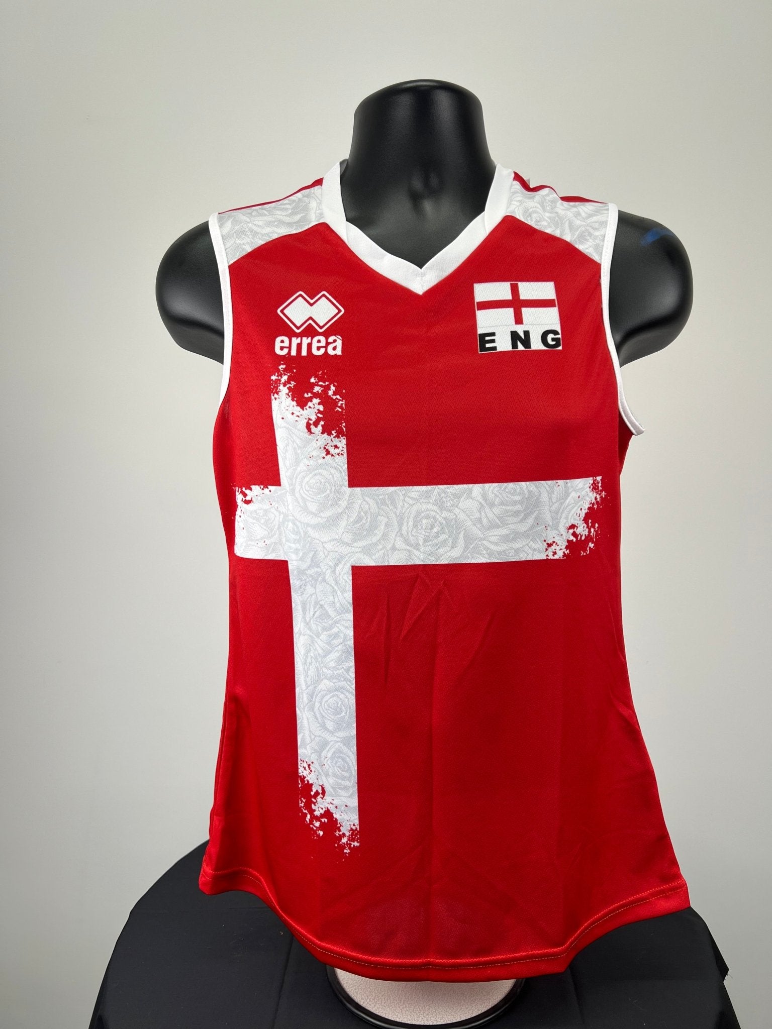 Front view of Women’s red and white England volleyball vest with cross and rose pattern