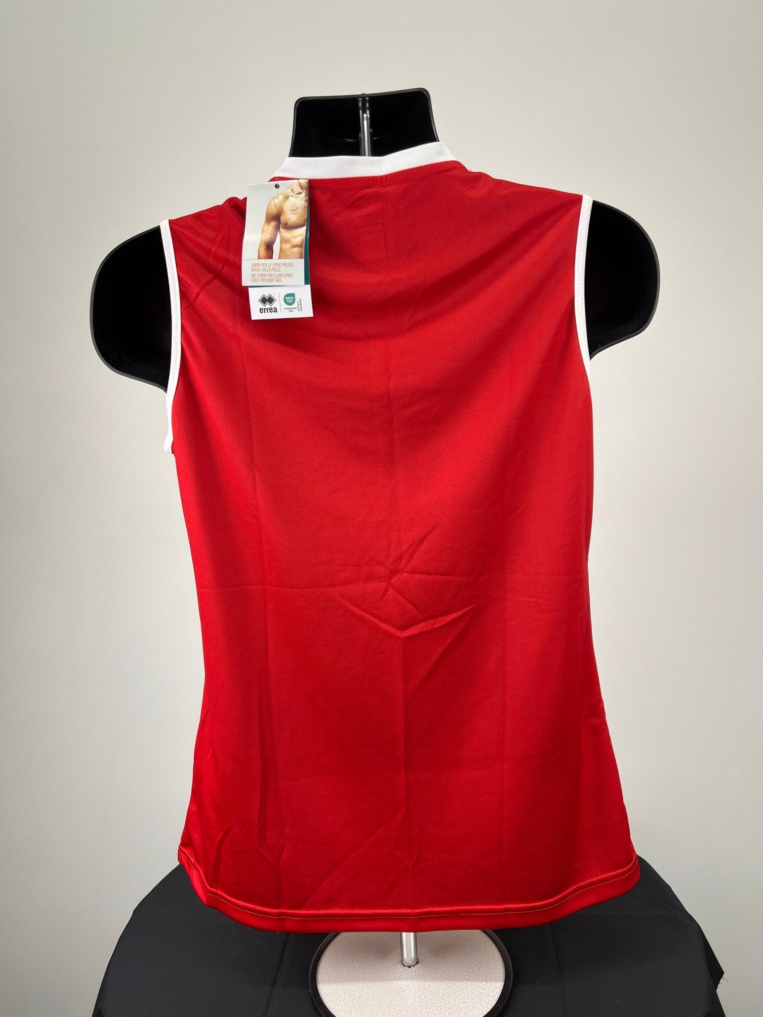 Back view of red volleyball vest with white trimmed neckline and armholes