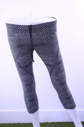 Front view of Nike patterned black and white Dri-Fit capri leggings XS
