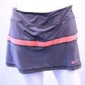Front view of Nike Dri-Fit skort in grey with pink stripe, XL size