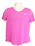 Front view of women's pink Nike mesh sports top with white swoosh logo