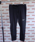 Black Nike sports leggings with Dri-Fit logo, displayed on a hanger against a kitround branded background