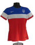 Nike USA Dri-FIT football shirt in red, white, and blue with USA crest and Nike logo, displayed on a mannequin