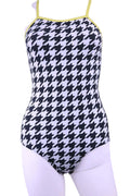 Front view of Slazenger black and white houndstooth swimsuit with yellow trim