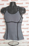 Front view of Reebok grey racerback sports vest with black detailing, displayed on mannequin