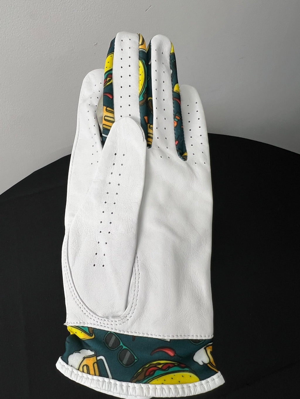 Women’s Skins Hold Golf Glove with taco motif and white leather, left hand, large, back view