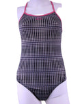 Front view of Slazenger geometric print swimsuit with pink trim and racerback