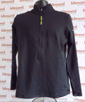 Front view of black Nike Pro long sleeve half zip sports top on mannequin