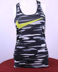 Front view of Nike women's sports vest with black and grey camouflage pattern and yellow Swoosh logo