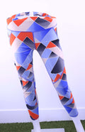 Front view of Sweaty Betty geometric 7/8 leggings in blue, red, white and black
