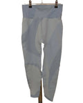 Light blue Sweaty Betty seamless leggings hanging on display