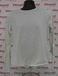 Front view of white Sweaty Betty long-sleeved training top on mannequin