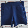 Front view of Umbro Pro Fleece Elite navy shorts with zip pockets, size XS