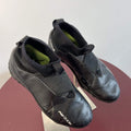 Pair of black Nike Mercurial Air Zoom football boots with laceless design on display