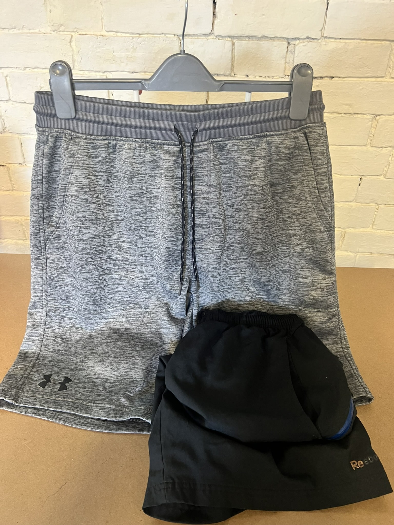 Two Pairs Men’s Sports Shorts – Under Armour & Reebok