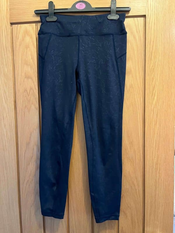Two Pairs of Women's Sports Leggings - Sweaty Betty and Under Armour - Image 3