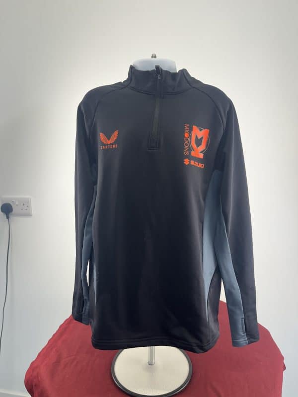 Youth’s Castore MK Dons Black Long Sleeve Sports Top Size M